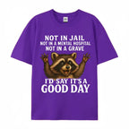 Women's Plus Size Funny Raccoon T-Shirt - "Not in Jail... Good Day" Sarcastic Graphic Tee - Soft Black Casual Top