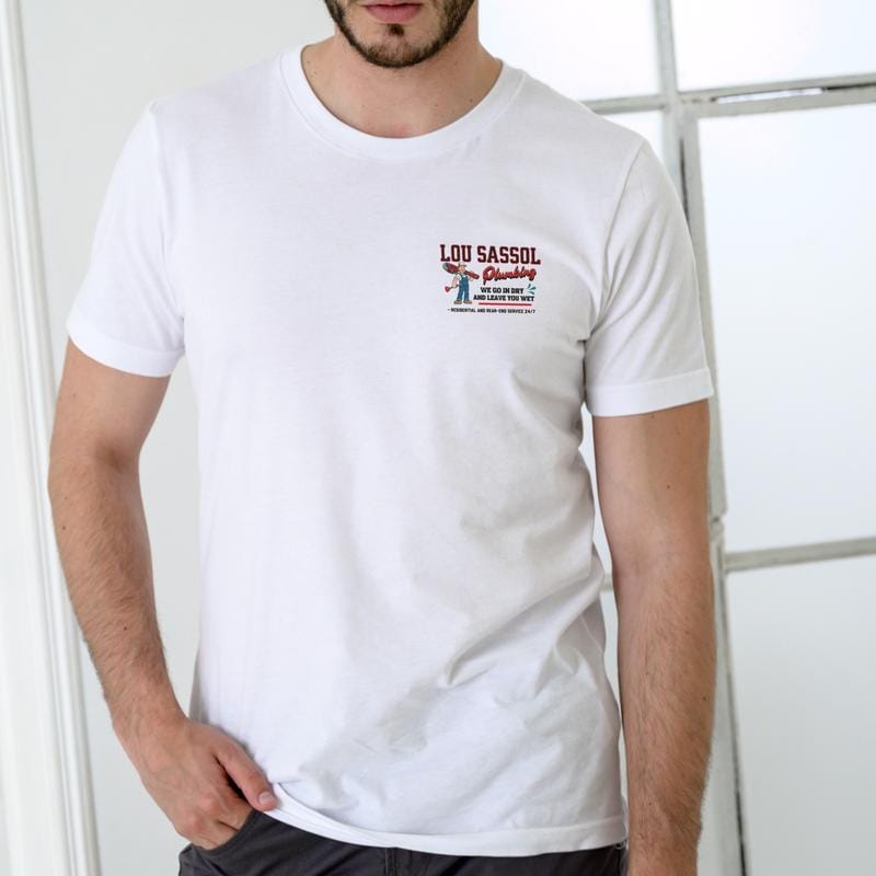 LOU SASSOL PLUMBING Unisex Cotton T-Shirt We Go In Dry And Leave Wet Funny Design for Plumbing Enthusiasts Comfortable Cotton Playful Design Ideal for Everyday Wear